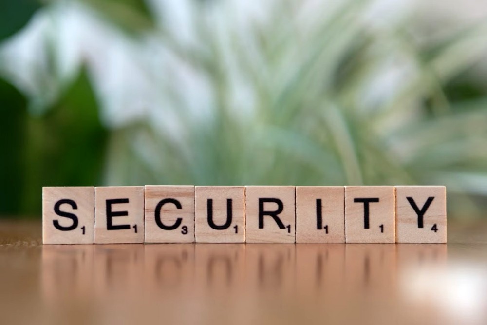 the word Security spelled in Scrabble tiles
