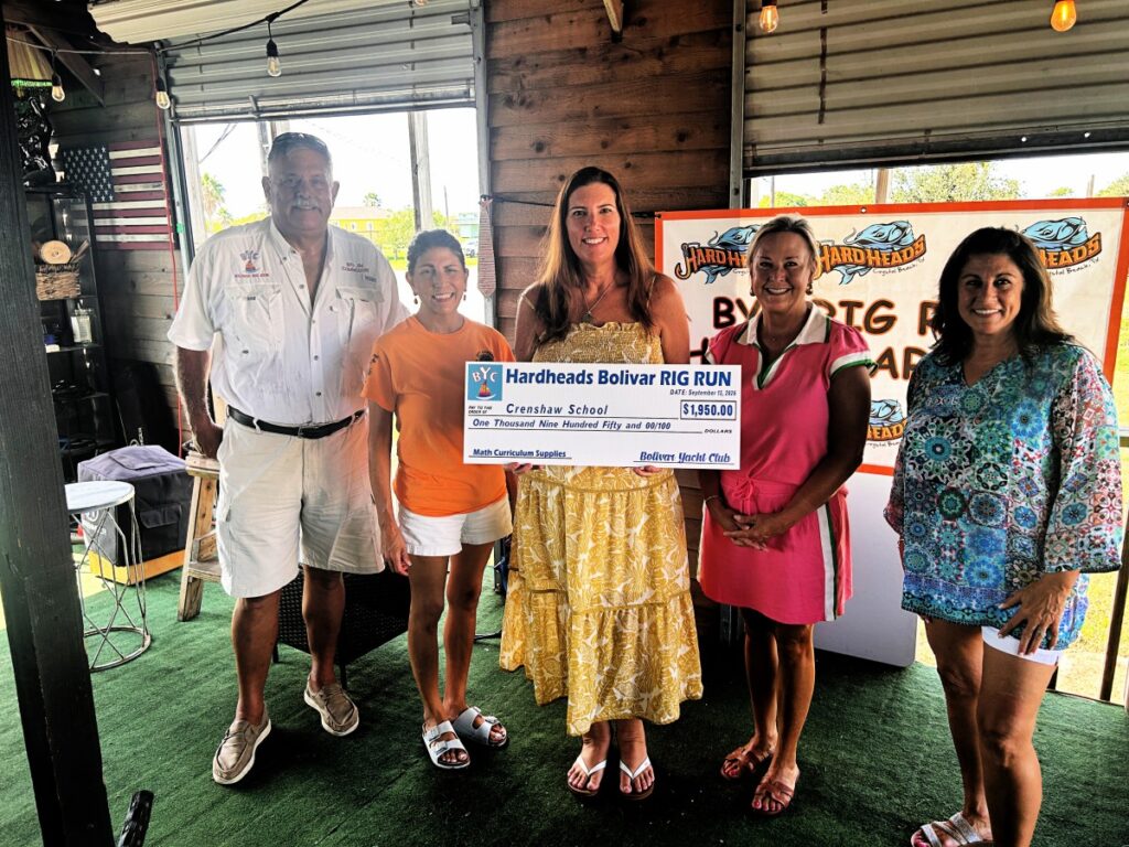 woman holding a check