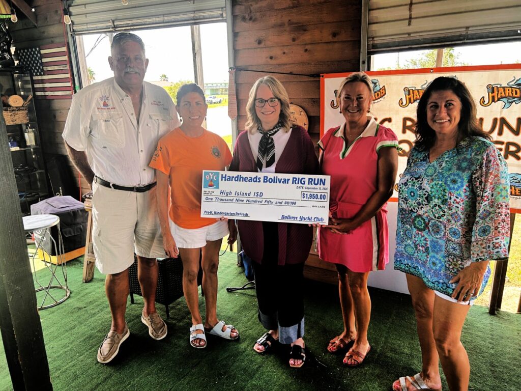 woman accepting a check