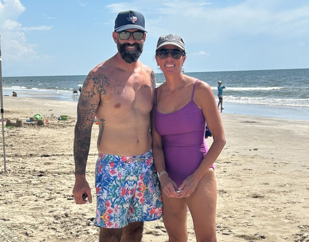 Man and woman in swim suits on the beach
