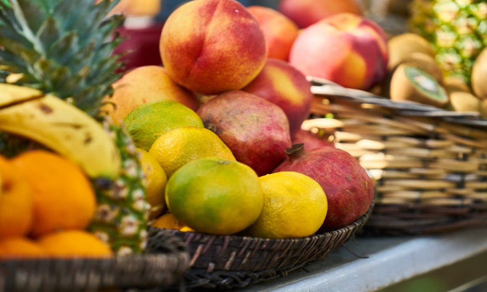 display of fresh fruits in woven basket